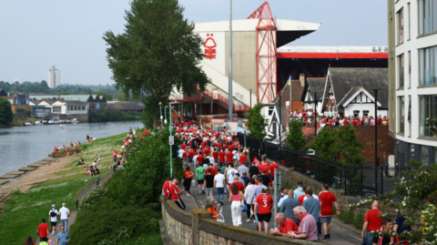 Fans walking to the City Ground in Nottingham