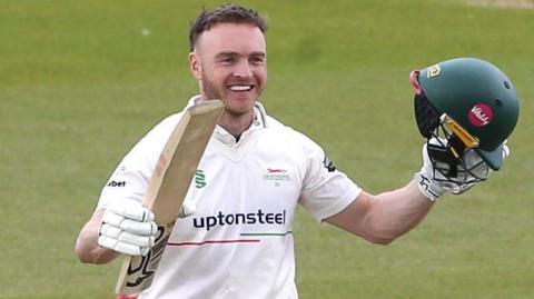 Ben Cox celebrates scoring century