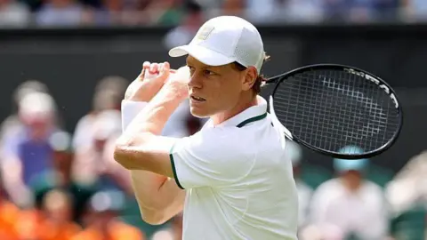 Cameron Norrie hits a forehand