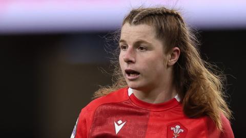 Kate Williams in the red jersey of Wales