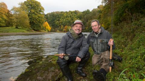 Bob and Paul on the bank of the River Tweed