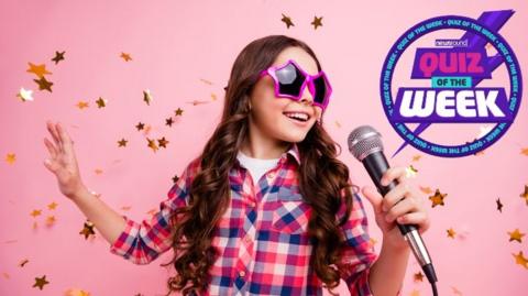 Girl with a microphone wearing star shaped glasses with the quiz of the week logo.