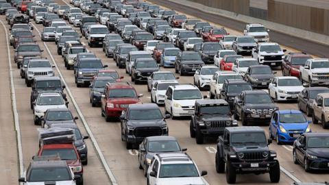 Traffic backs up on southbound Interstate 805 as people are about to enter Tijuana, Mexico at the Otay Mesa Port of Entry on May 3, 2025 in San Diego, California.