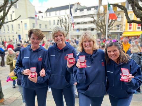 The four rowers with their medals 