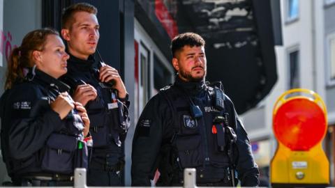 Three police officers