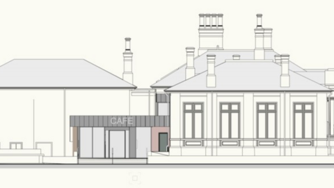 A drawing showing how Cleator Moor library and the former Credit Union building will look. There is a cafe linking the two buildings. The building on the left has a pitched roof and a chimney, while the one on the right has several chimneys and four large windows at the front. The cafe is not as tall as the other buildings and has a flat roof.