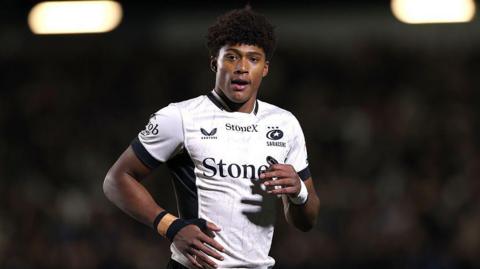 Noah Caluori wearing a white Saracens shirt