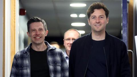 West Bromwich Albion sporting director Andrew Nestor walking with new head coach Ryan Mason