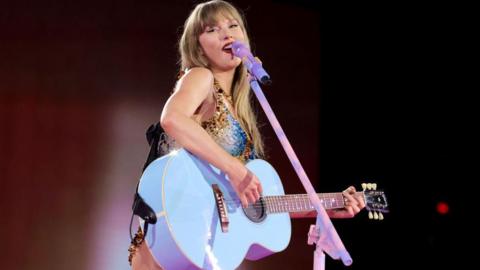 Taylor Swift performs onstage during The Eras Tour