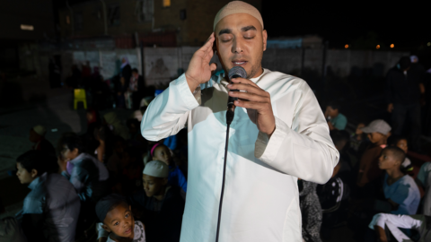 A man calling Muslims to prayer in Manenberg, Cape Town - South Africa