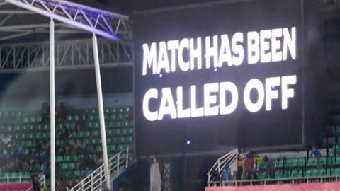 Scoreboard saying match has been called off