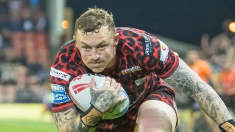 Josh Charnley scoring a try