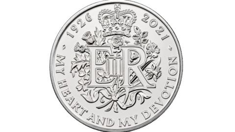 A new £5 coin commemorating the 95th birthday of Queen Elizabeth II which is part of a range of new designs that will be appearing on British coins throughout 2021.
