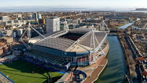 Aerial view of Cardiff city centre, Principality Stadium, Arms Park and down to the Bristol Channel