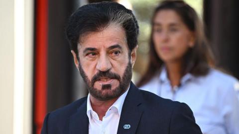 Mohammed Ben Sulayem wearing a black suit jacket and a white shirt