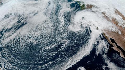 Satellite image of a "Pineapple Express" weather system, or atmospheric river, off the US west coast in 2024