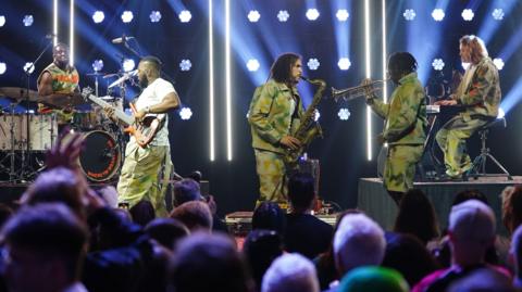 Ezra Collective performing on stage after winning the 2023 Mercury Prize with their second studio album Where I'm Meant To at the awards show at the Eventim Apollo in London.