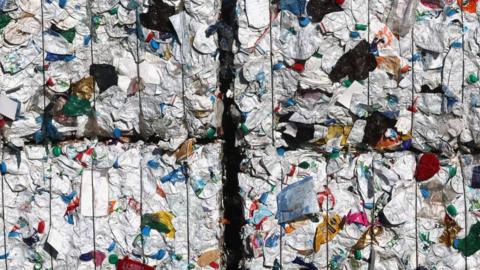 Compressed plastic at recycling plant