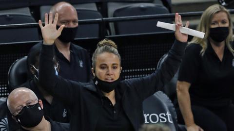 San Antonio Spurs assistant coach Becky Hammon directs her team against the Los Angeles Lakers