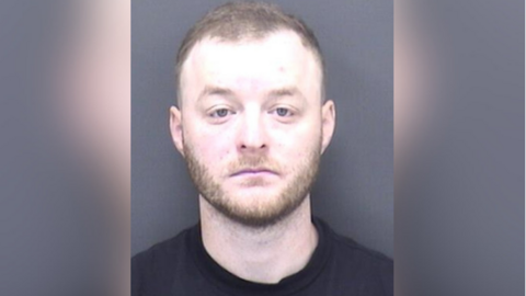 Connor O'Brien's mugshot. He wear a black shirt.