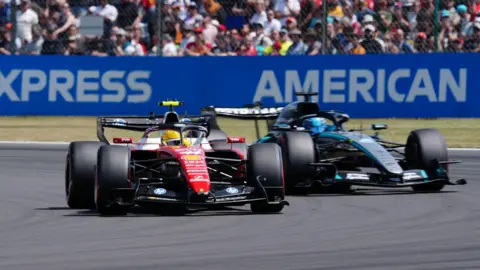 Ferrari's Lewis Hamilton and Mercedes' George Russell almost side by side during practice for the British Grand Prix