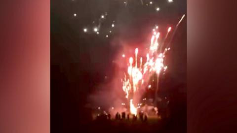 Fireworks being set off in a public park in Reading on New Year's Eve.