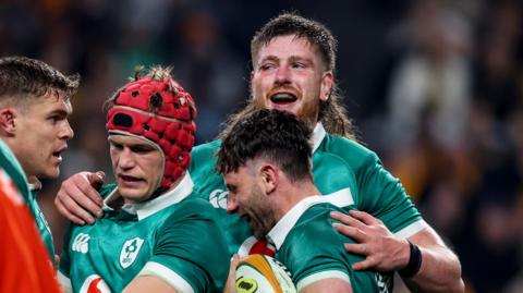 Ireland celebrate Hugo Keenan's try