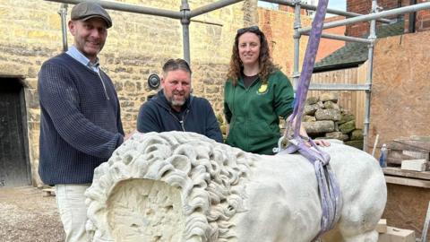 Stonemason Paul Booth, left, and Friends of Weelsby Woods members Lee Grey and Jemmima Edwards