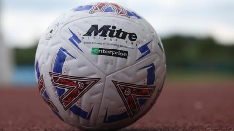 National League matchball on an athletics track 
