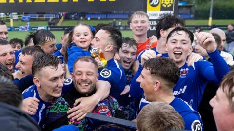 Penybont players and fans celebrate their Play-Off win over Haverfordwest