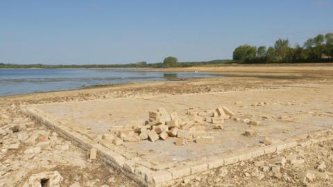 The exposed ruins of Mr Appleton's bungalow underneath Rutland Water.