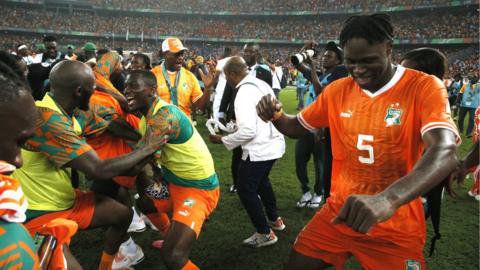 Wilfried Singo leads the celebrations after Ivory Coast reach the 2023 Africa Cup of Nations final