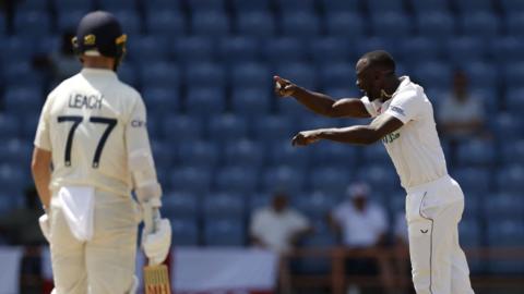 Kemar Roach celebrates wicket