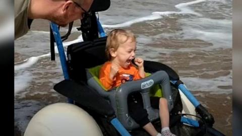 Boy in special wheelchair