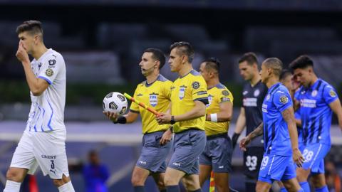 Players leave the pitch