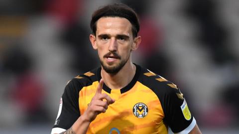 Liam Shephard (pictured in Newport County strip from his previous tenure with the club, shown here celebrating a goal)
