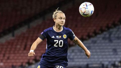 Martha Thomas of Scotland attacks the ball