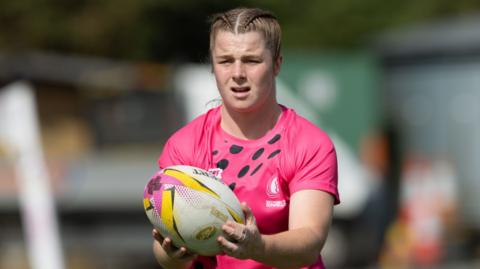 Kate Williams warms up