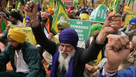 Farmers shout slogans during a protest against India's central government to demand minimum crop prices in Amritsar on 5 March 2024.