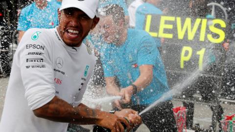 Lewis Hamilton celebrates winning the Italian Grand Prix