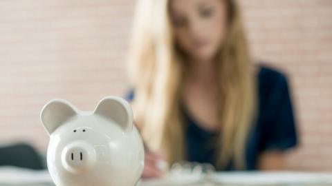 Student and piggy bank