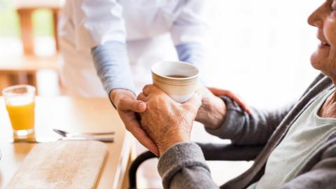 Pensioner given tea by home carer