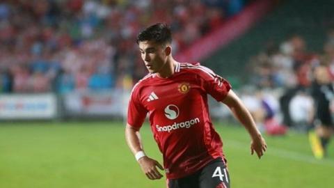 Manchester United defender Harry Amass