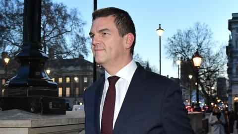 Sir Olly Robbins in a suit and tie in a photo taken in 2019.,