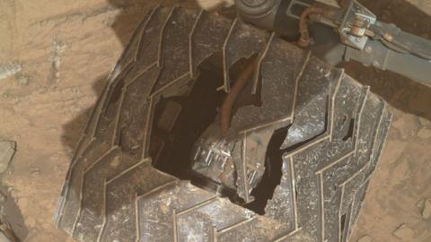 Holes in the wheel of Nasa's Mars rover Curiosity