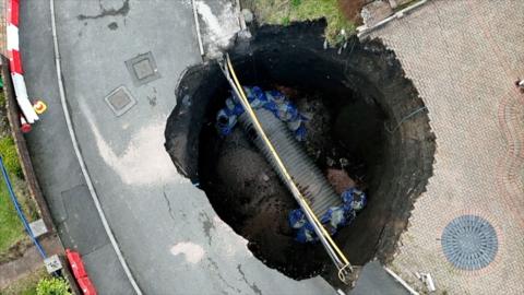 sinkhole being filled in Merthyr Tydfil 