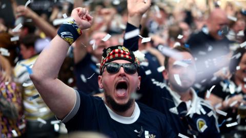 Scotland fans celebrating at the Glasgow Fan Zone after Scott McTominay scored a goal in Scotland's Uefa Euro 2024 game against Switzerland on June 19, 2024.