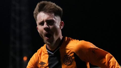 Ben Knight celebrates scoring for Cambridge