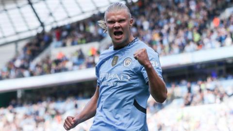 Erling Haaland celebrating after scoring a goal