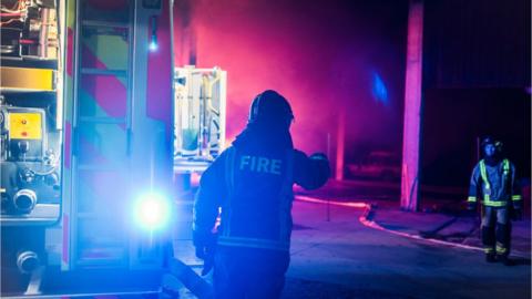 A stock image of fire fighters